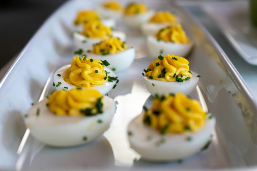 A tray of deviled eggs ready for a holiday gathering
