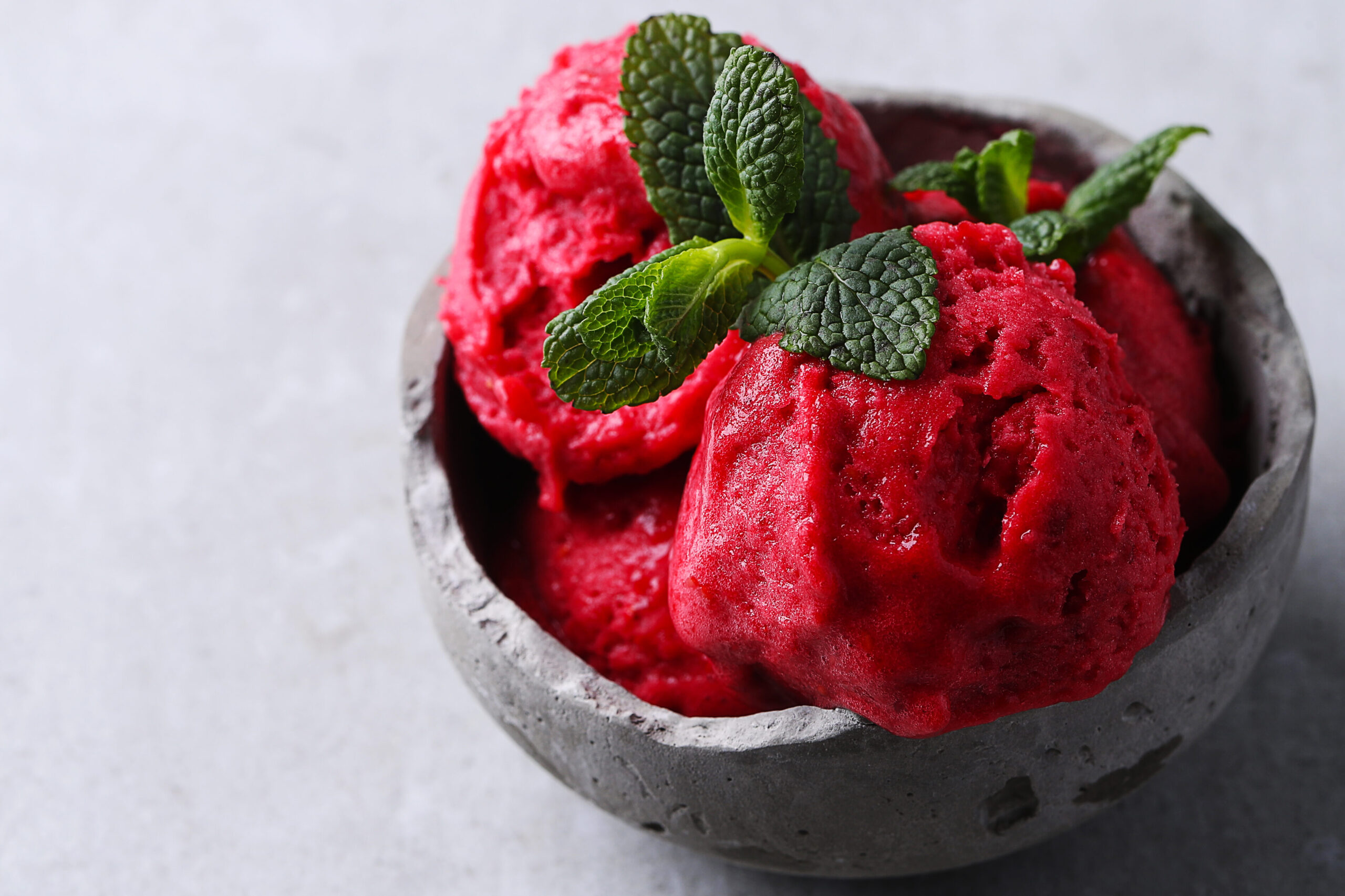 Ice cream. Delicious, strawberry gelato in a bowl